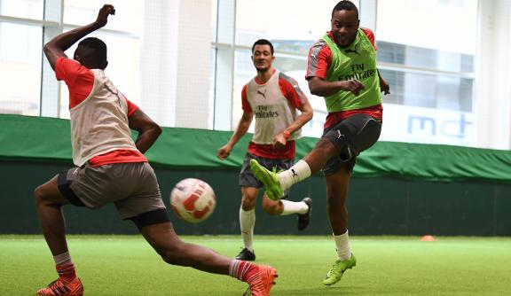 Members of the football group playing at Arsenal's training ground